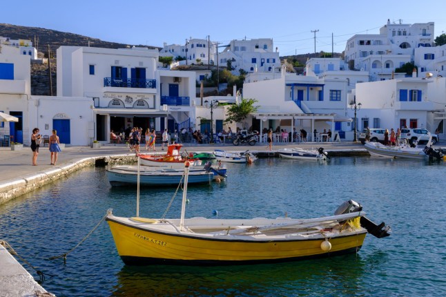 Panormos, Tinos, GR - 6 August 2023: Fishing boat in Panormos harbour